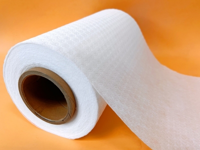 Embossed/perforated hot air non-woven fabric